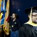 A Michigan graduate walks out of the tunnel and enters the Crisler Center floor on Sunday. Daniel Brenner I AnnArbor.com